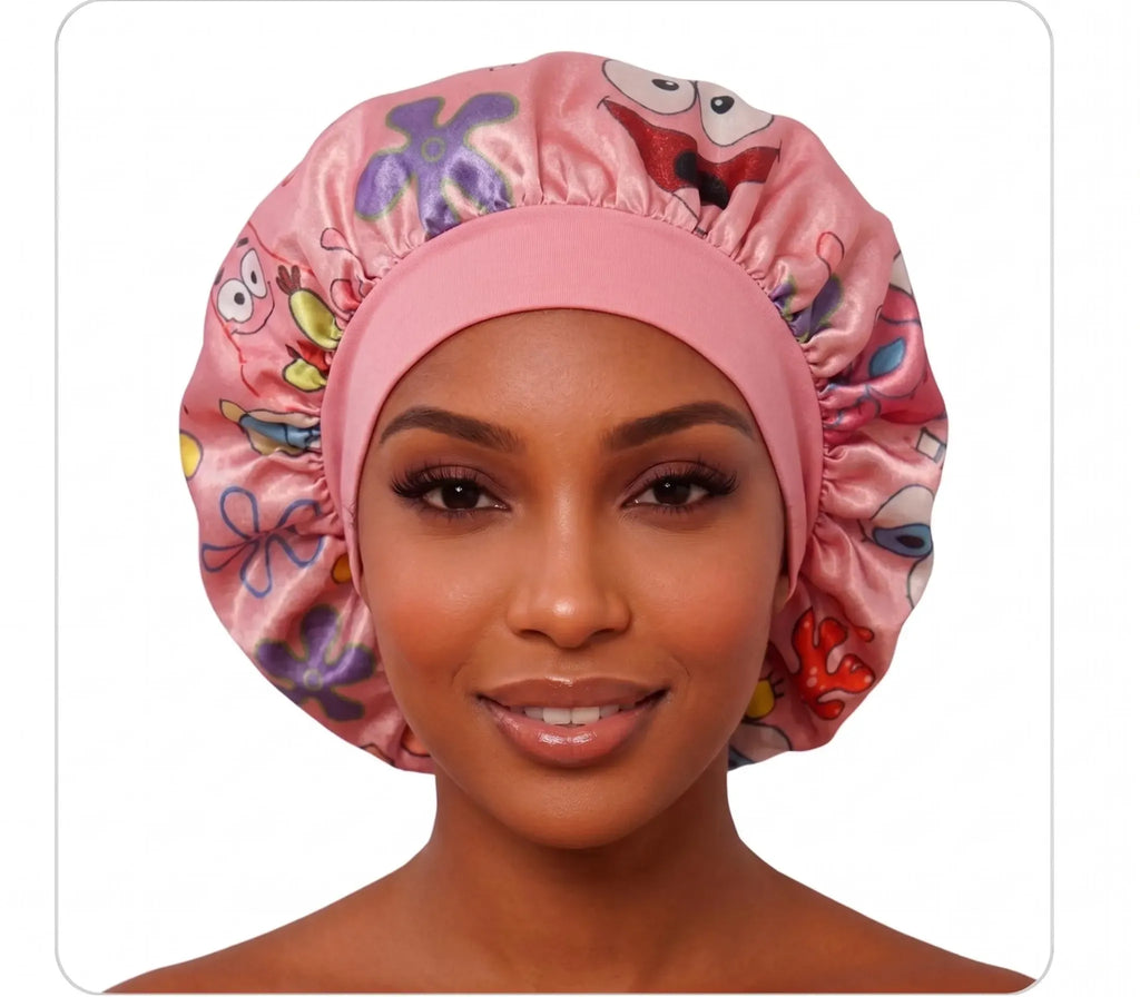 Cartoon Besties reversible satin bonnet pink side with wide fabric band